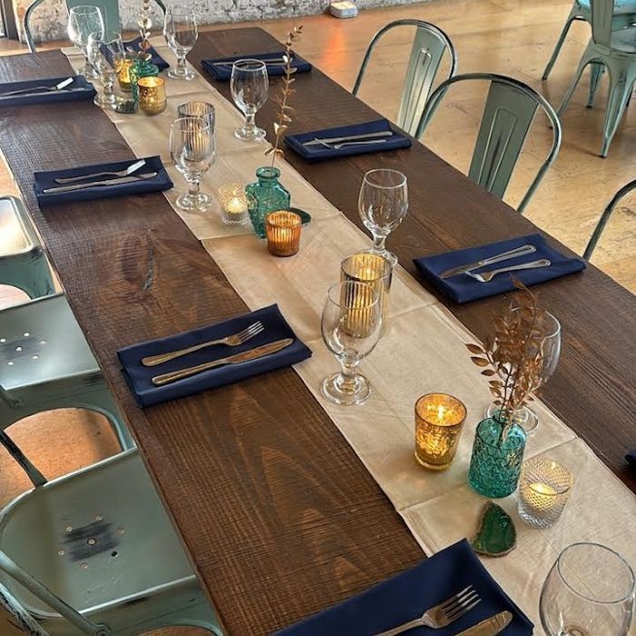 Long table with navy napkins