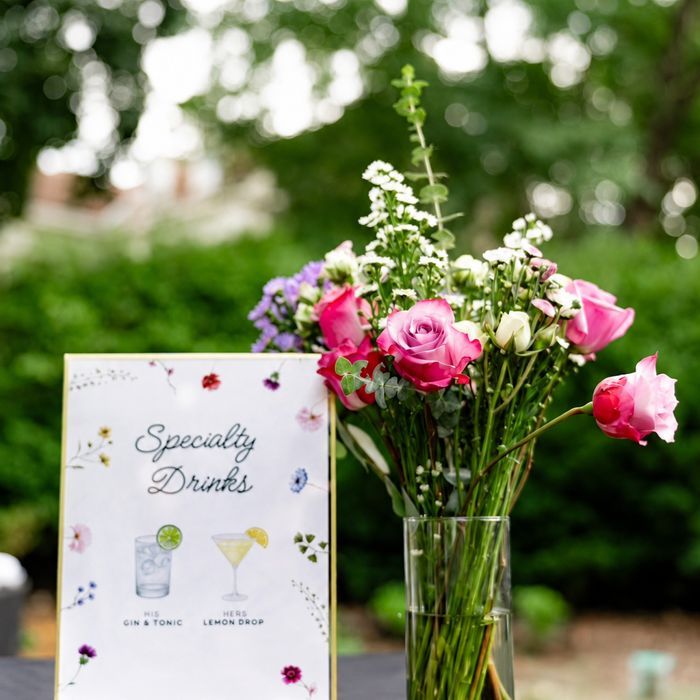 Specialty Drinks sign with flowers